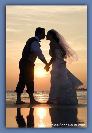 married couple kissing at sunset, florida beach wedding, romance, sunset
