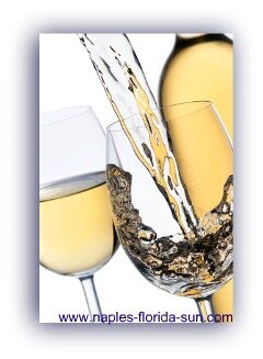 glass of white wine, pouring wine, best of naples fl